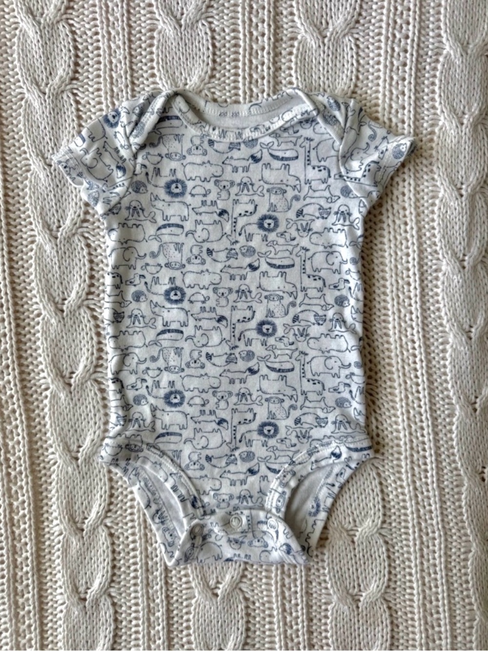 Carter's Cream One-Piece with Navy Animal Print